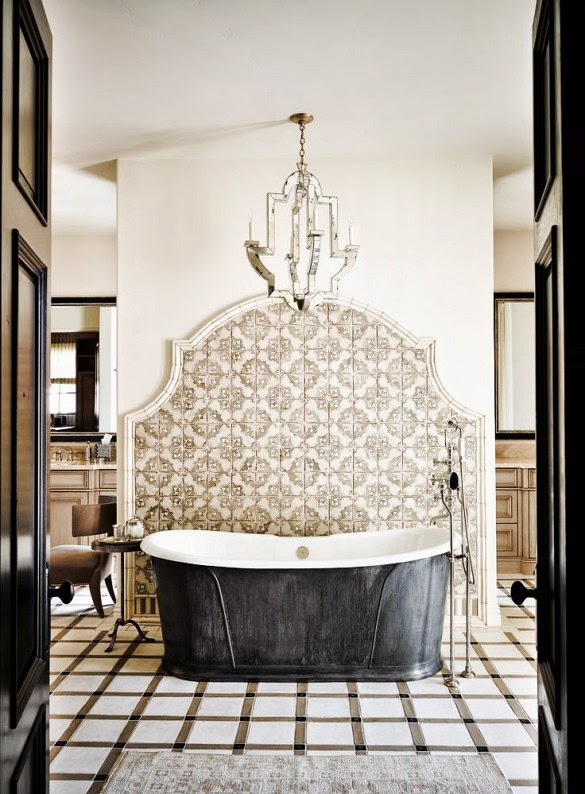 Whether you're seeking a quiet place to unwind or a glamorous place to primp, these bathroom retreats offer up the perfect blend of serenity and style.